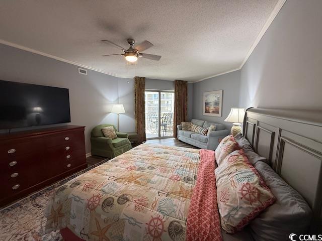 9994 Beach Club Drive, Unit 1204 Myrtle Beach, SC 29572 - Photo 30 of 36 Bedroom with crown molding, a textured ceiling, and a ceiling fan