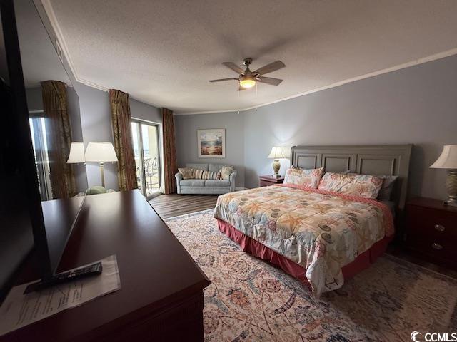 9994 Beach Club Drive, Unit 1204 Myrtle Beach, SC 29572 - Photo 31 of 36 Bedroom with access to outside, ceiling fan, crown molding, and wood finished floors