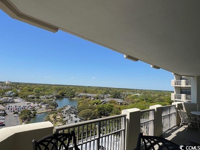 9994 Beach Club Drive, Unit 1204 Myrtle Beach, SC 29572 - Photo 35 of 36 Balcony featuring view of wooded area