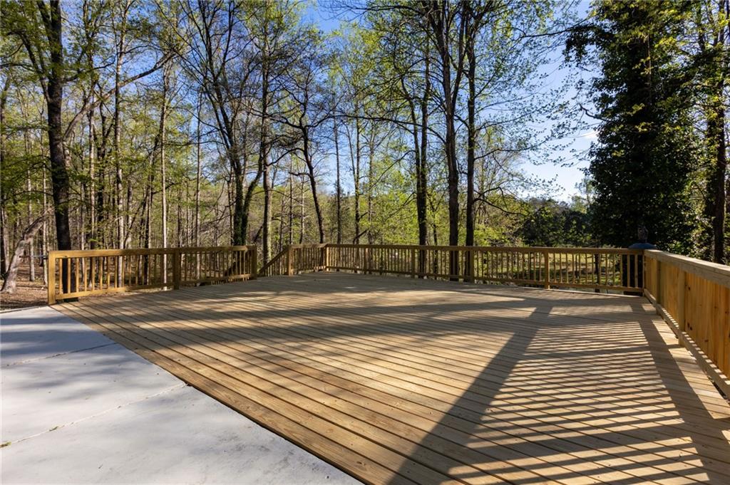 143 Swanson Road Fayetteville, GA 30214 - Photo 23 of 27 a view of a yard with large trees