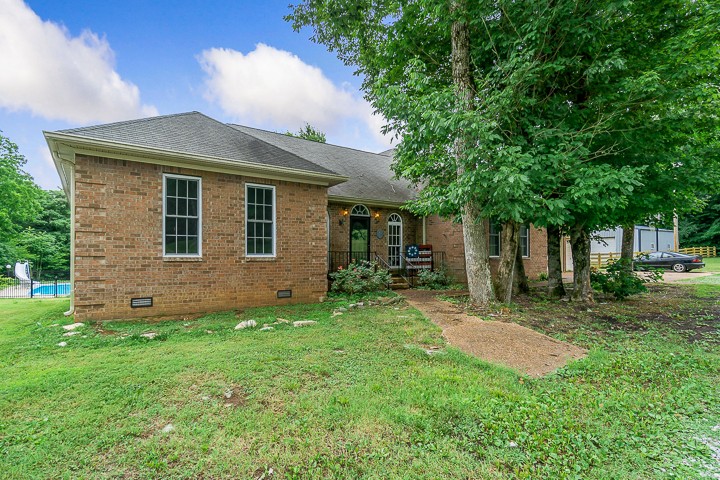 162 Hiwassee Road Lebanon, TN 37087 - Photo 1 of 50 a front view of a house with a garden