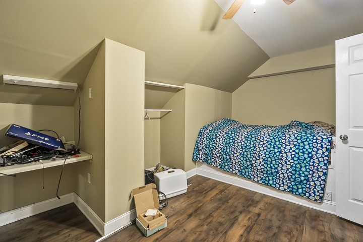 162 Hiwassee Road Lebanon, TN 37087 - Photo 40 of 50 a bedroom with a bed and wooden floor