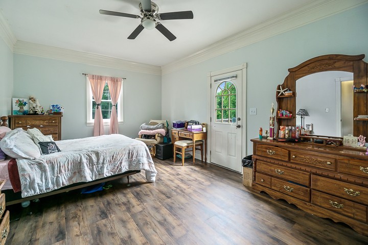 162 Hiwassee Road Lebanon, TN 37087 - Photo 44 of 50 a bedroom with a bed and wooden floor
