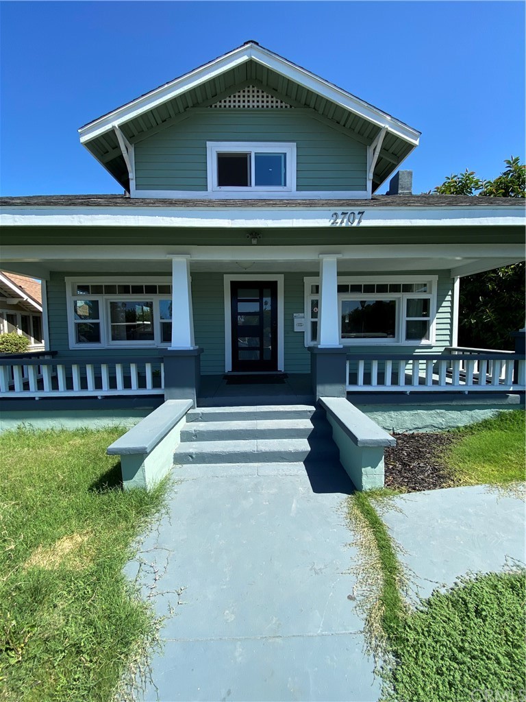 2707 Cridge Street Riverside, CA 92507 - Photo 1 of 1 a front view of a house with a garden