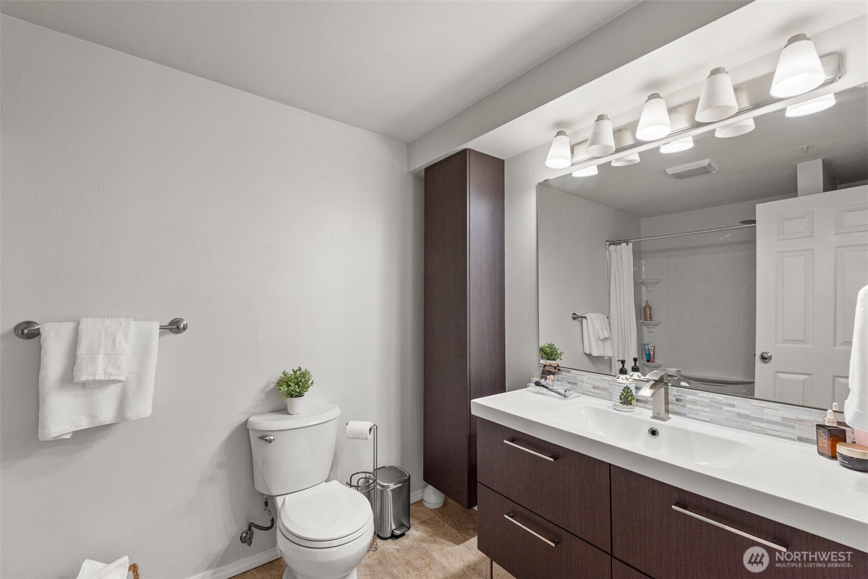 4423 249th Terrace Southeast Issaquah, WA 98029 - Photo 14 of 27 a bathroom with a sink vanity mirror and toilet