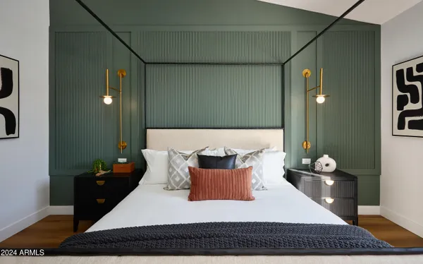 a bathroom with a double vanity sink toilet and shower