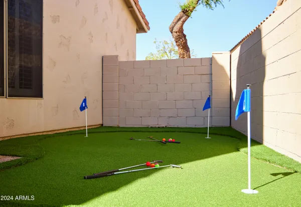 a backyard of a house with lots of green space