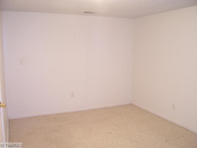 6040 Parnell Road Winston-Salem, NC 27107 - Photo 13 of 15 4th Bedroom. Downstairs Bedroom