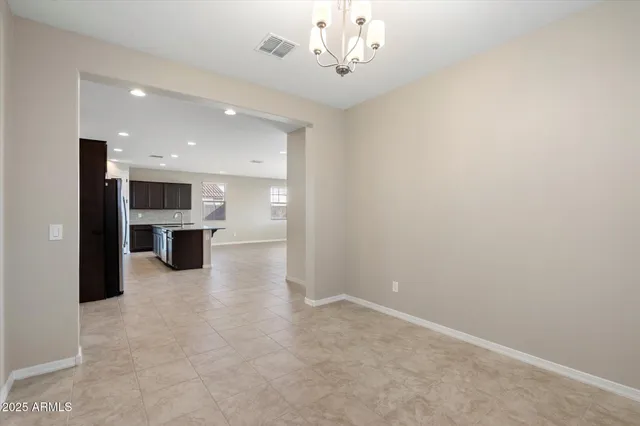 a view of a kitchen with a sink and a kitchen