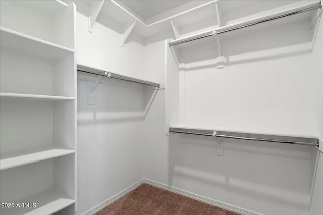 a view of an empty walk in closet