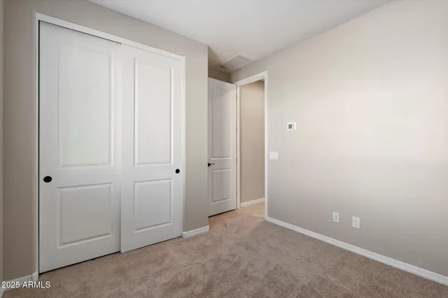 a bathroom with a granite countertop sink toilet a large mirror a shower and bathtub