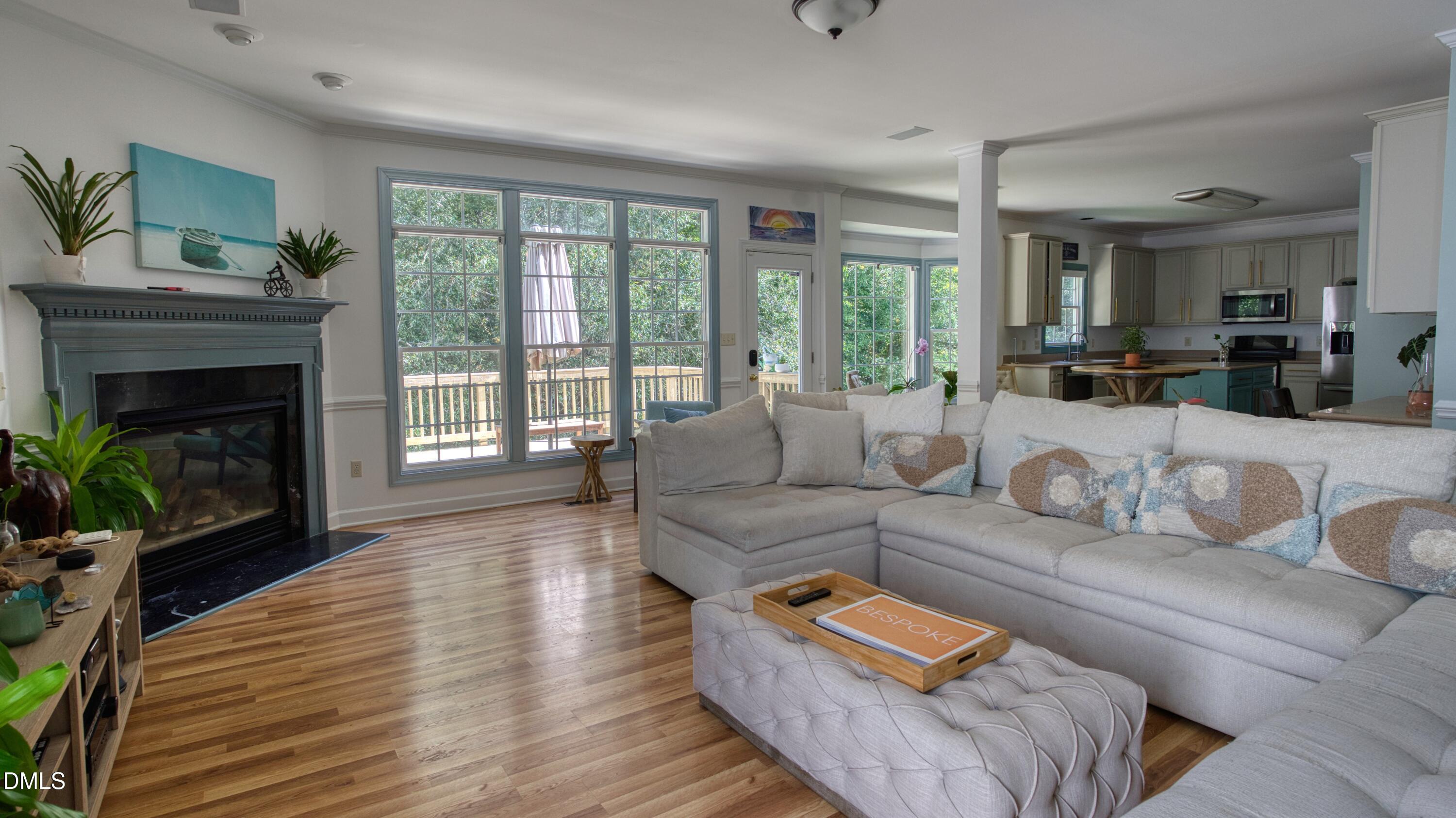 7 Monteith Court Durham, NC 27713 - Photo 20 of 44 a living room with furniture and a fireplace
