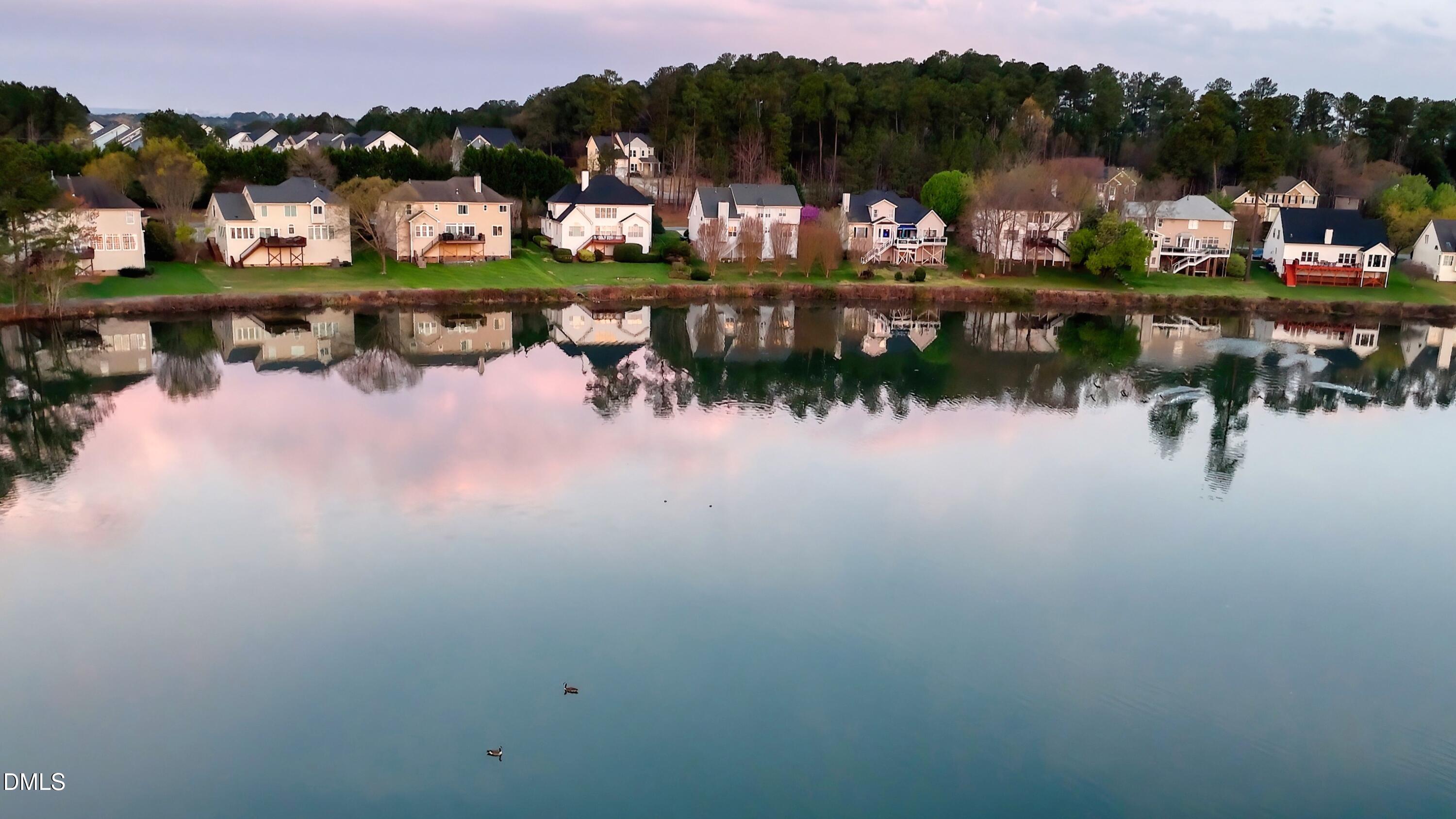 7 Monteith Court Durham, NC 27713 - Photo 2 of 43 a view of swimming pool with a lake view
