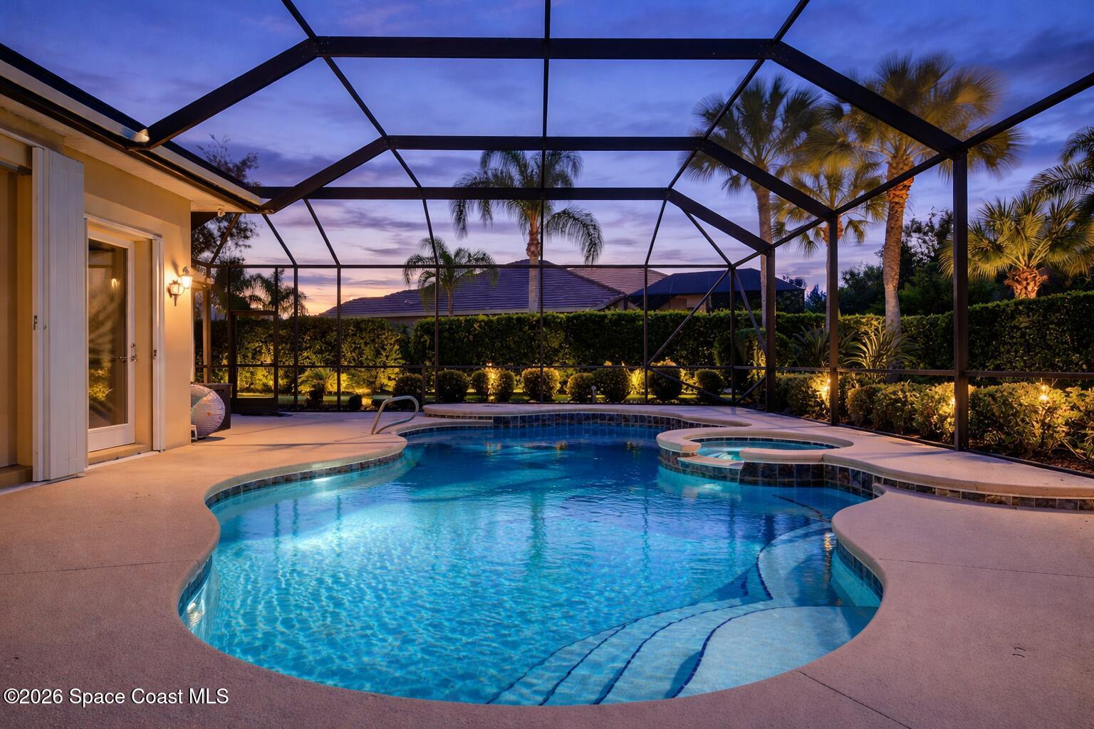 8201 Compton Way Melbourne, FL 32940 - Photo 41 of 52 a view of a swimming pool with a patio