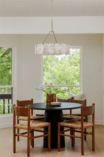 a large living room with stainless steel appliances kitchen island granite countertop furniture