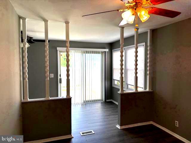 50 Gerard Road Hamilton, NJ 08620 - Photo 13 of 19 a view of an empty room with window and wooden floor