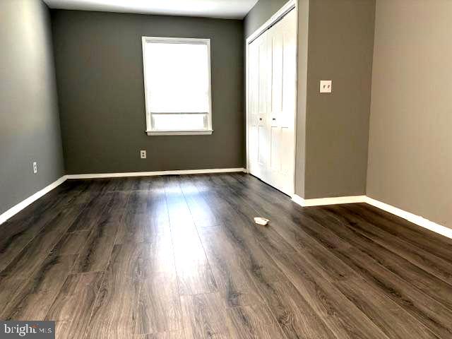 50 Gerard Road Hamilton, NJ 08620 - Photo 16 of 19 an empty room with wooden floor and windows