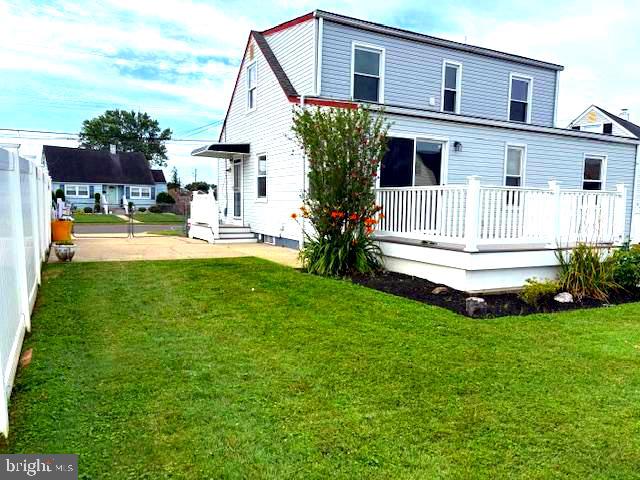 50 Gerard Road Hamilton, NJ 08620 - Photo 4 of 19 a front view of a house with a yard table and chairs