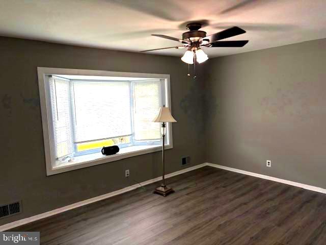 50 Gerard Road Hamilton, NJ 08620 - Photo 8 of 19 a view of an empty room with wooden floor and a window