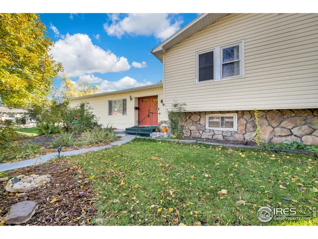 a view of backyard with seating space