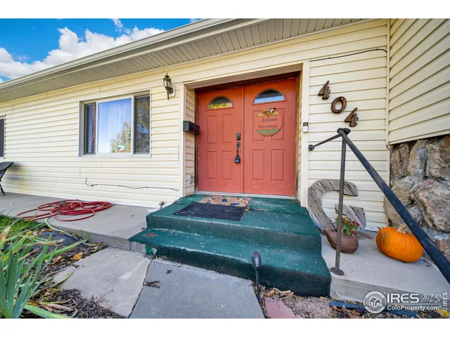 a backyard of a house with seating space