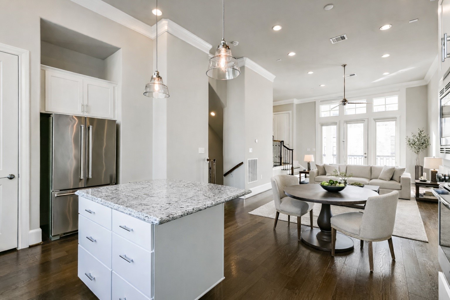 9507 London Bridge Station Houston, TX 77045 - Photo 16 of 32 a kitchen with granite countertop white cabinets and stainless steel appliances
