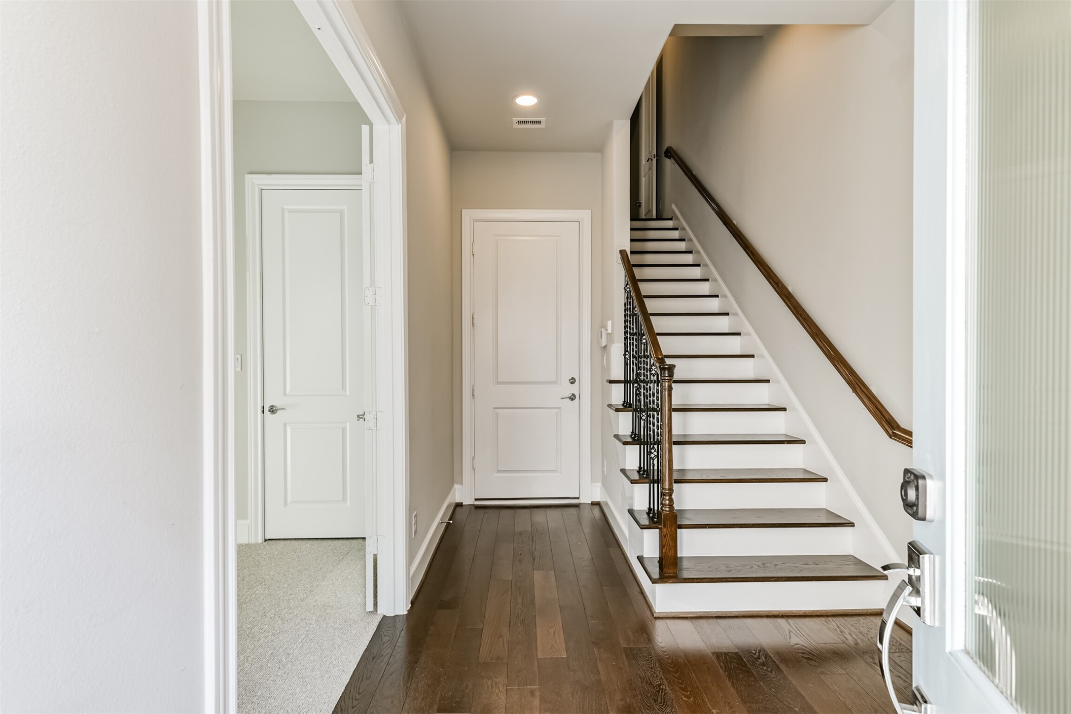 9507 London Bridge Station Houston, TX 77045 - Photo 6 of 32 a view of entryway and hall with wooden floor