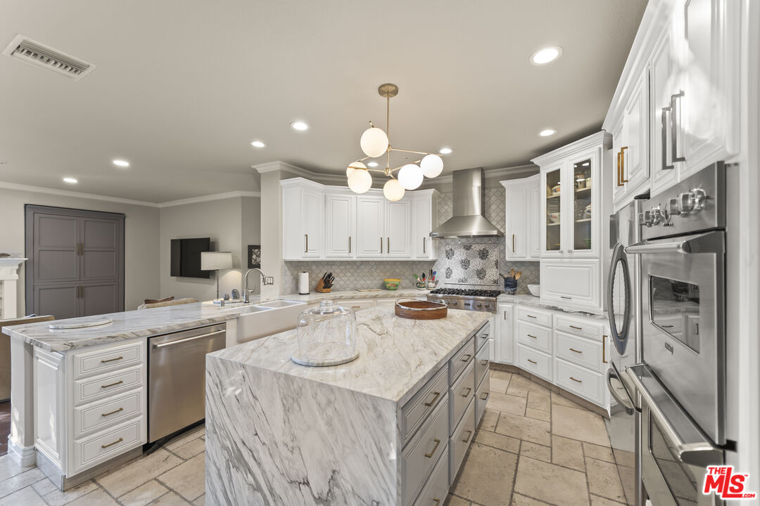 6738 Andover Lane Los Angeles, CA 90045 - Photo 1 of 24 a kitchen with a stove a sink and a refrigerator