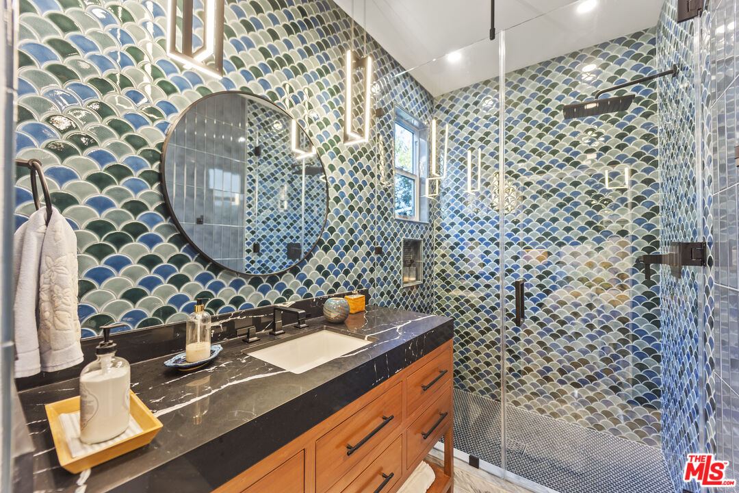 6738 Andover Lane Los Angeles, CA 90045 - Photo 19 of 24 a bathroom with a sink and a mirror