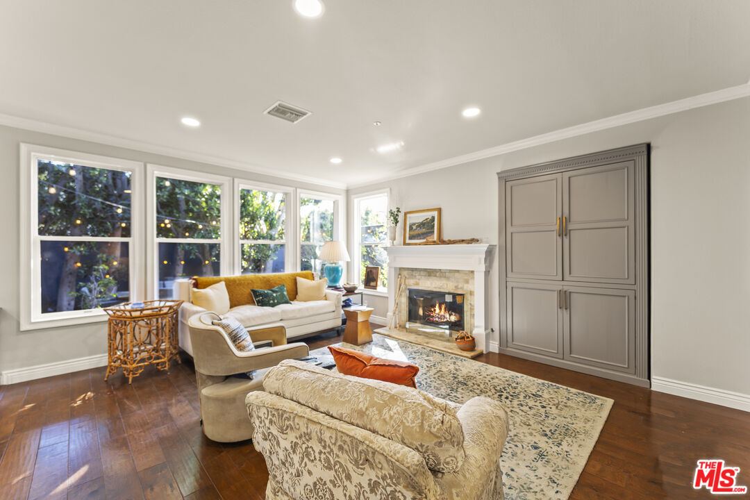 6738 Andover Lane Los Angeles, CA 90045 - Photo 9 of 24 a living room with furniture and a fireplace