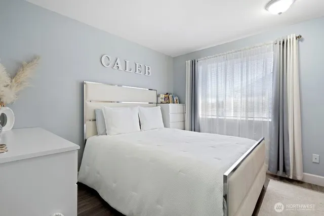 a utility room with a sink washer and dryer