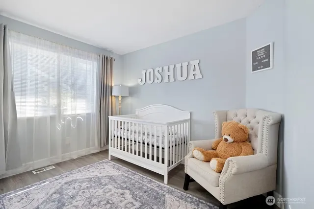 a bedroom with furniture and a bed