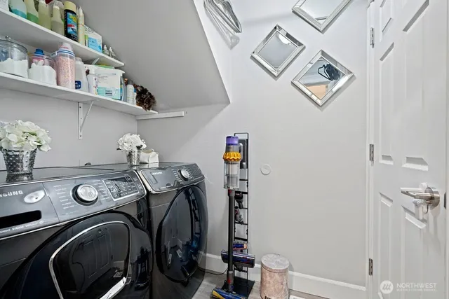 a view of storage and utility room with racks on the wall
