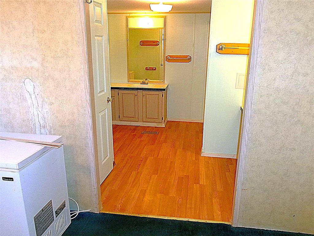3231 Portside Drive May, TX 76857 - Photo 11 of 26 a bathroom with a sink and a mirror