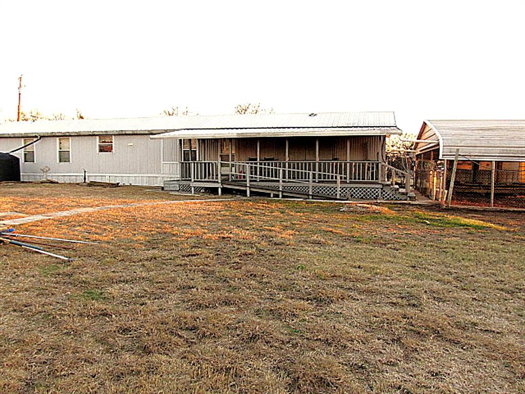 3231 Portside Drive May, TX 76857 - Photo 2 of 26 a view of a house with backyard