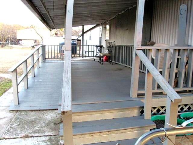 3231 Portside Drive May, TX 76857 - Photo 3 of 26 a view of stairs and with an outdoor seating
