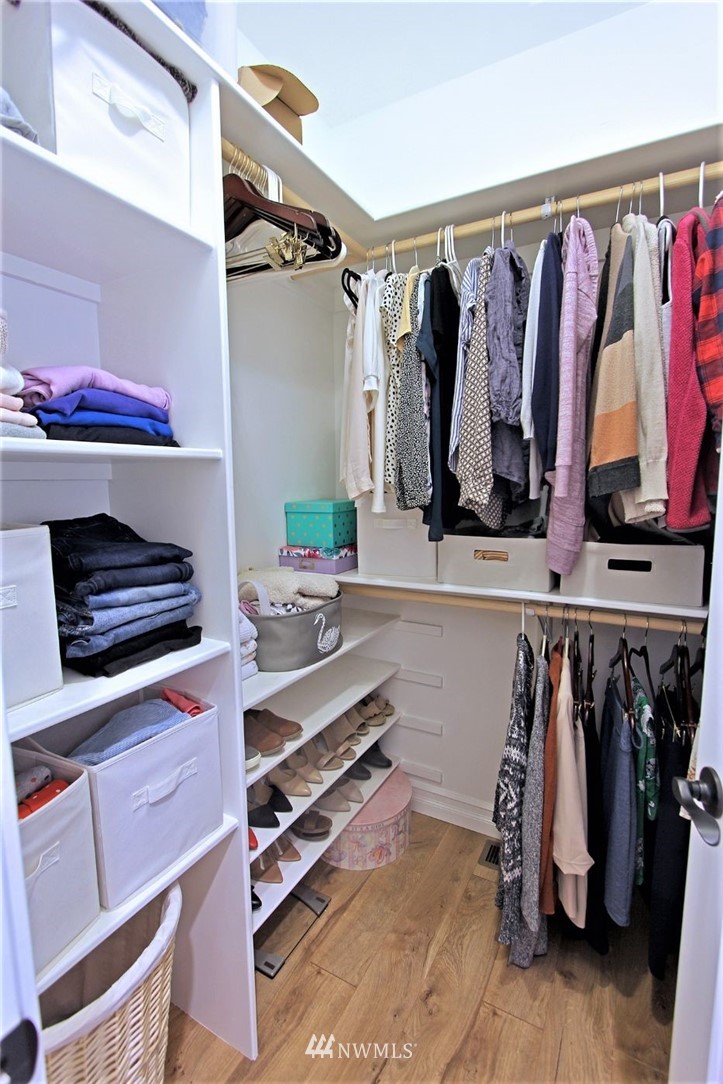 6737 Rd D.8 Northeast Moses Lake, WA 98837 - Photo 17 of 24 a view of walk in closet with clothes and shoes