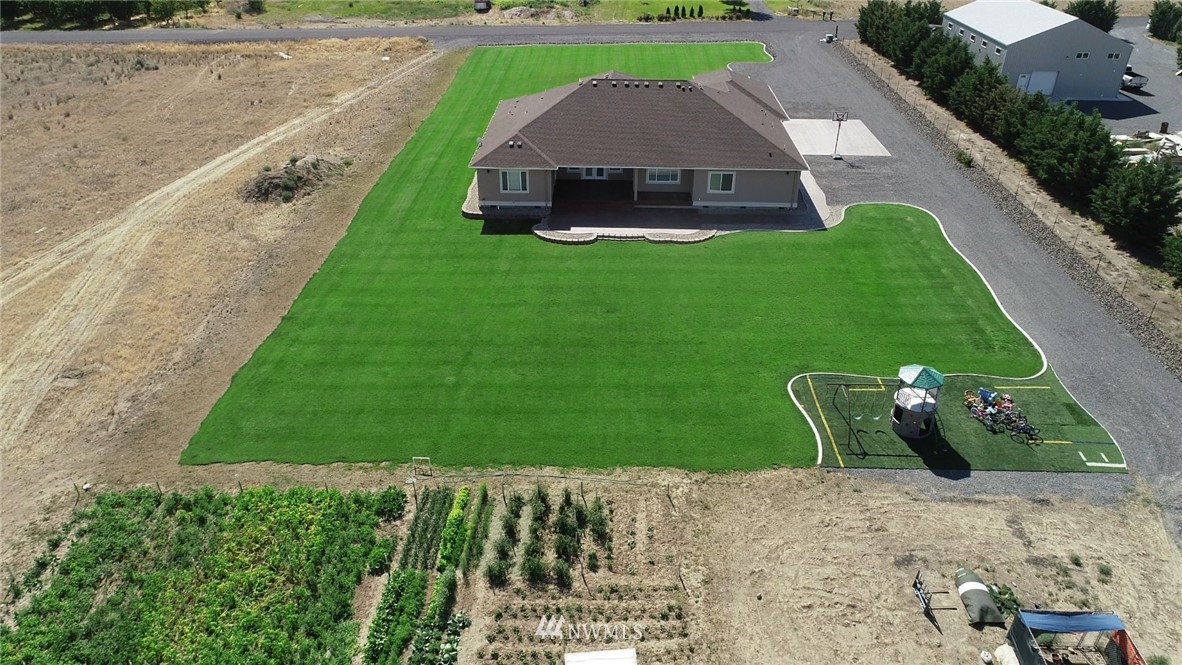 6737 Rd D.8 Northeast Moses Lake, WA 98837 - Photo 5 of 24 a aerial view of a house