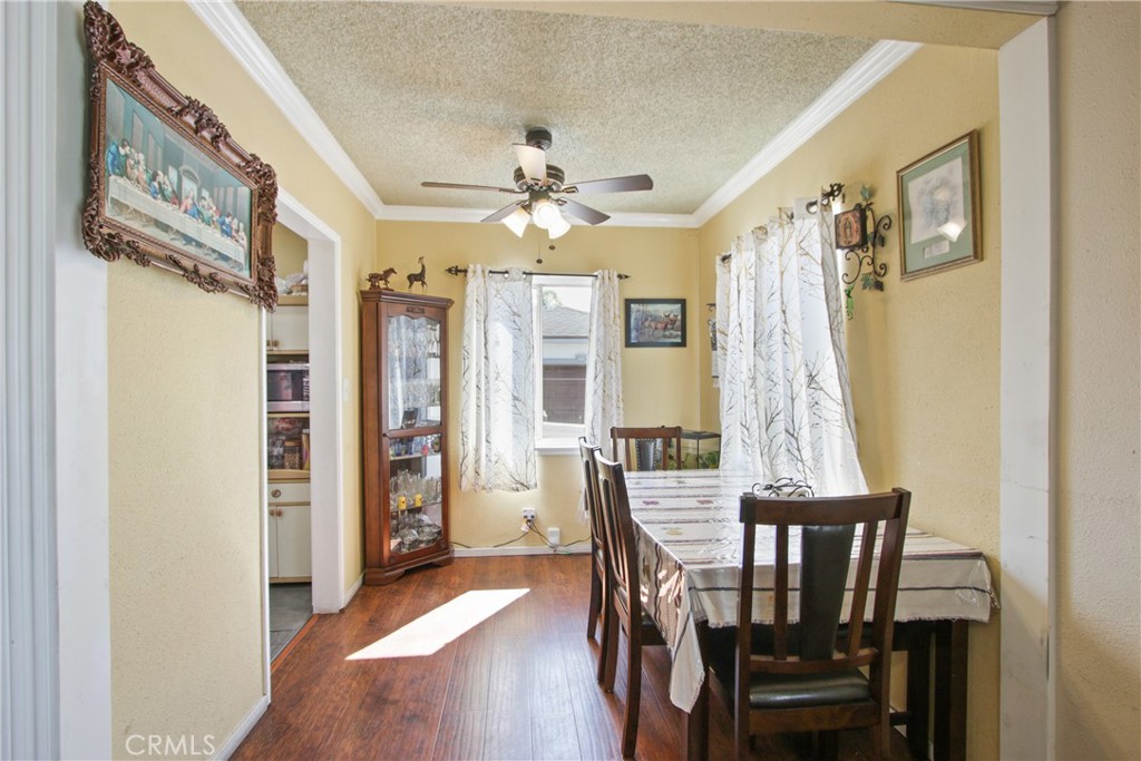 618 East 225th Street Carson, CA 90745 - Photo 6 of 14 a view of a dining room with furniture window and wooden floor