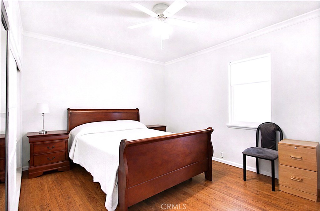 618 East 225th Street Carson, CA 90745 - Photo 9 of 14 a bedroom with a bed and a dresser