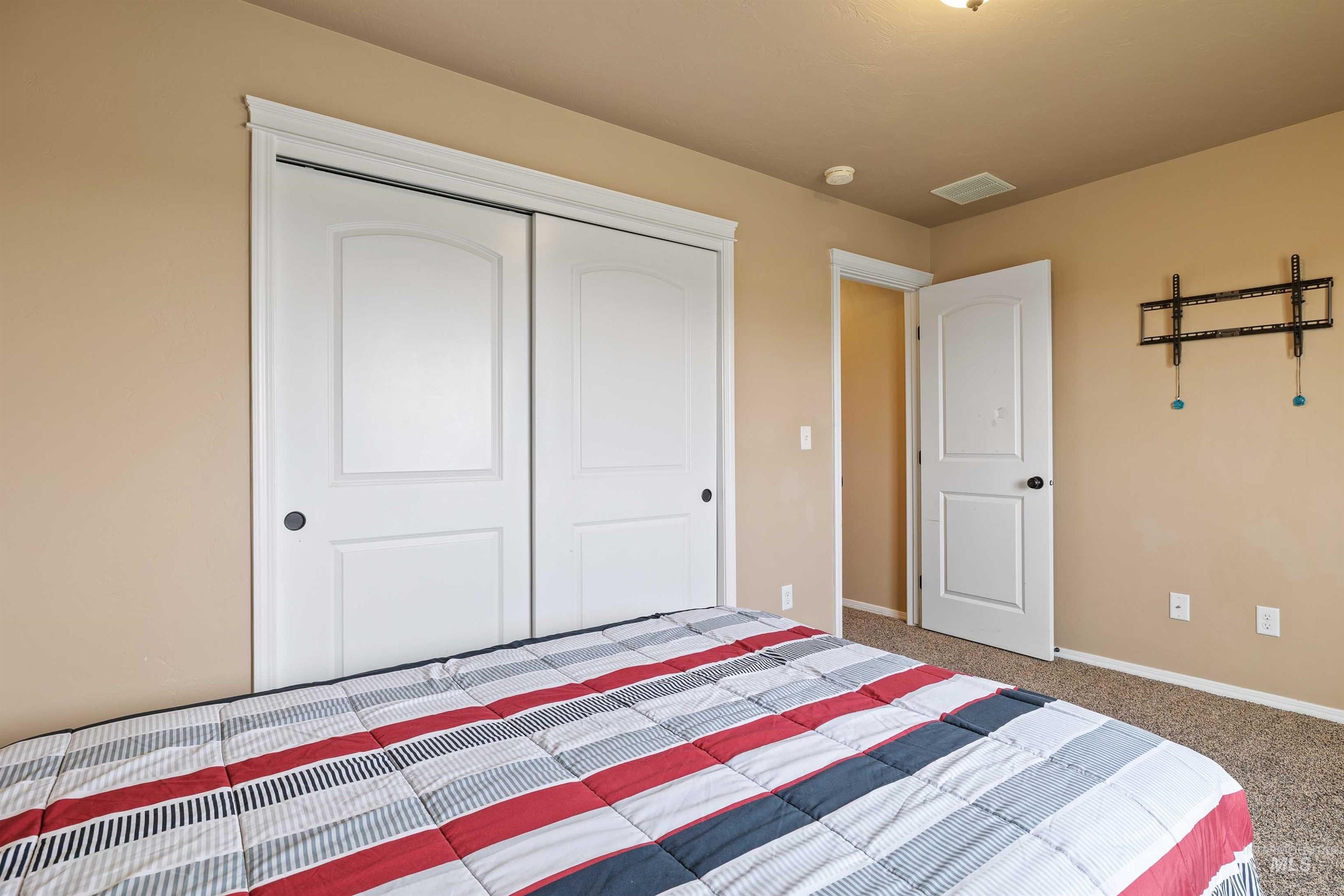 134 North 50 West Rupert, ID 83350 - Photo 16 of 36 Unfurnished bedroom with carpet and a closet