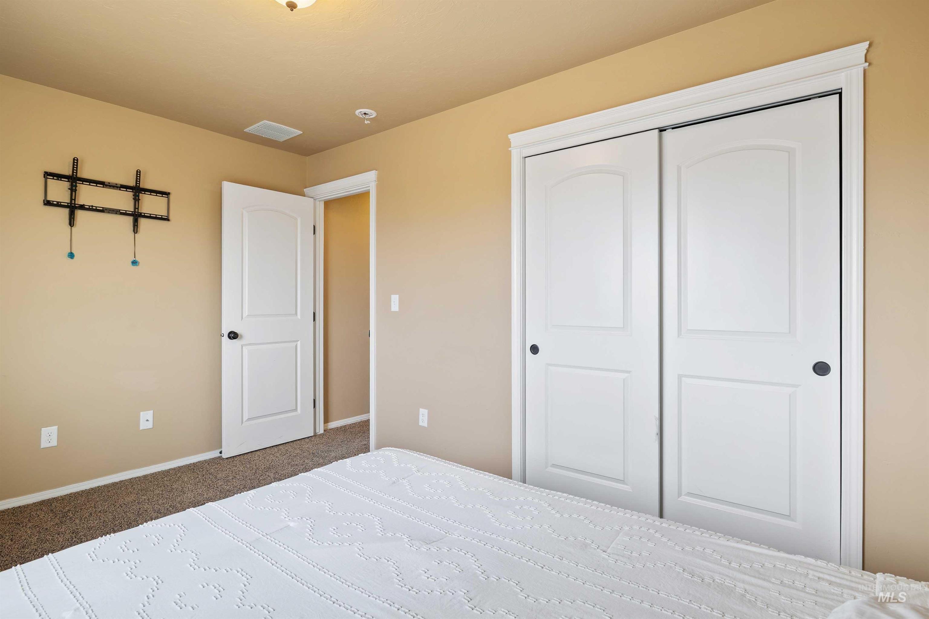 134 North 50 West Rupert, ID 83350 - Photo 19 of 36 Bedroom with carpet flooring and a closet