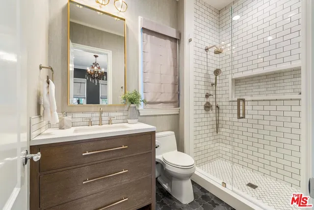 a living room with furniture a rug and a large window