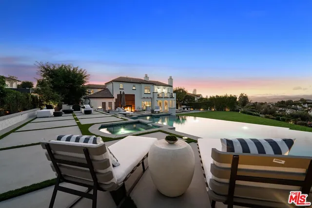 a view of a golf course with a lake