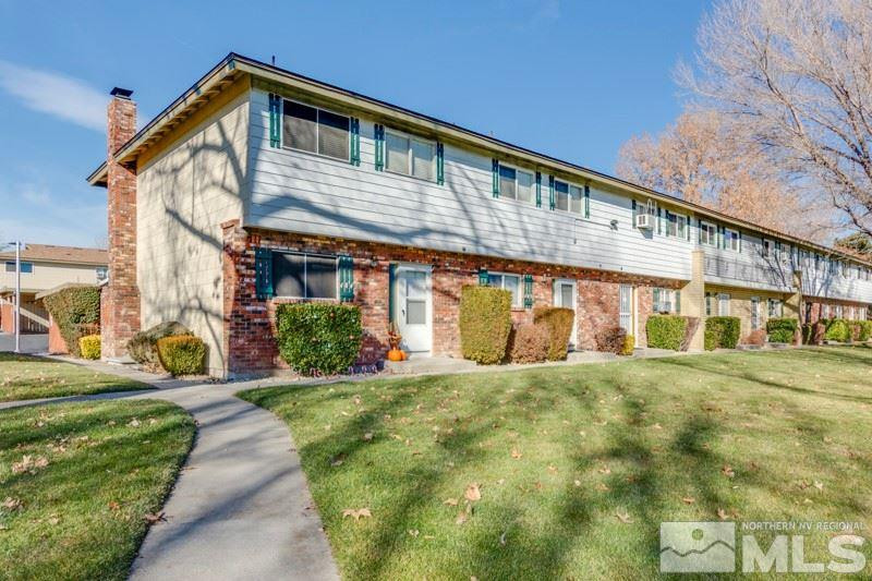 404 Smithridge Drive Reno, NV 89502 - Photo 2 of 12 a front view of a house with a yard
