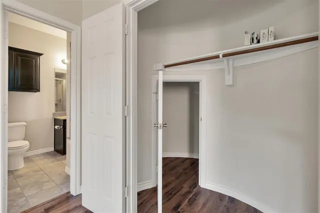 a bathroom with a toilet and a sink