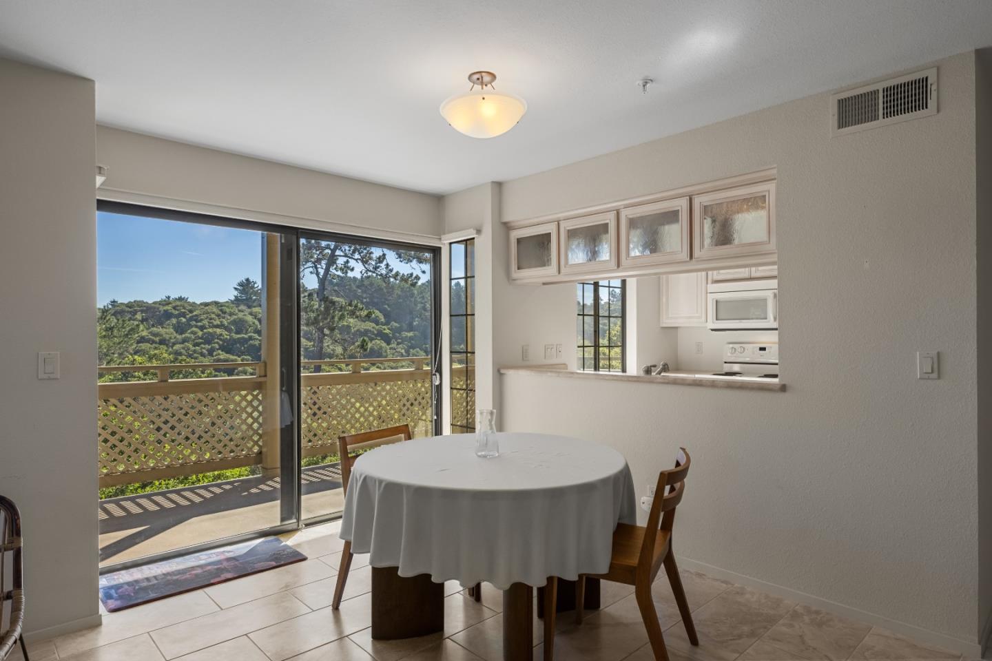121 Quail Run Court Del Rey Oaks, CA 93940 - Photo 5 of 33 a view of a dining room with furniture window and outside view