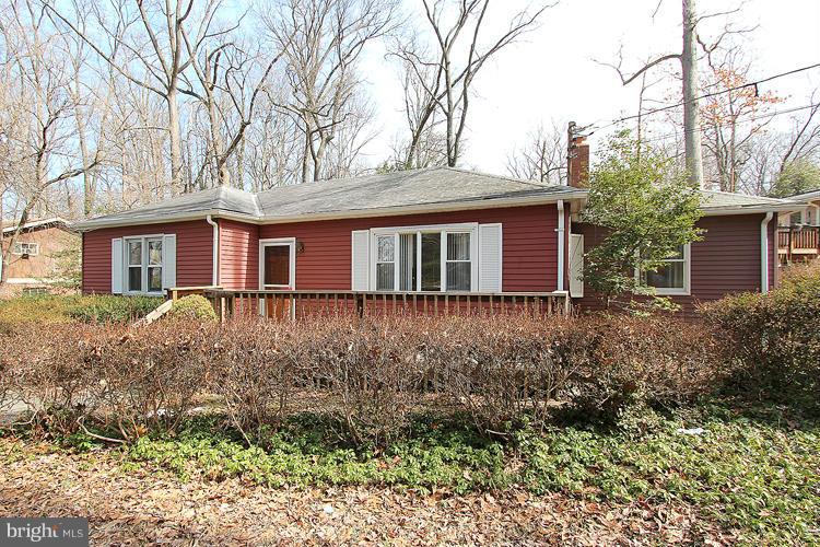 11601 Gail Place Silver Spring, MD 20902 - Photo 3 of 30 front view of a house with a yard