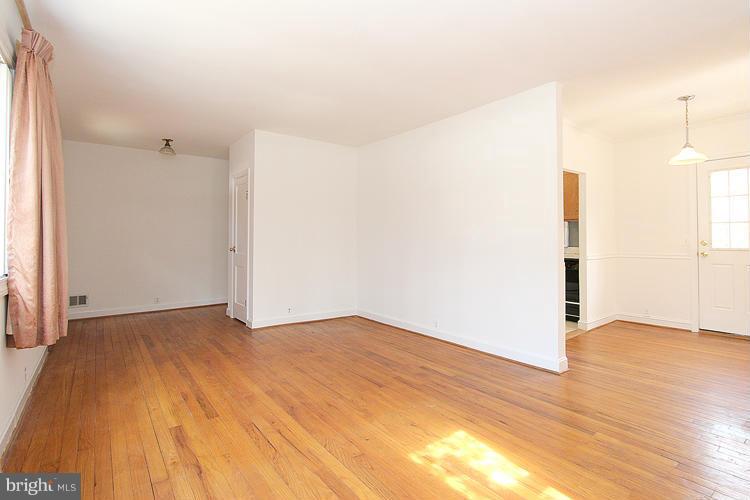 11601 Gail Place Silver Spring, MD 20902 - Photo 9 of 30 a view of empty room with wooden floor