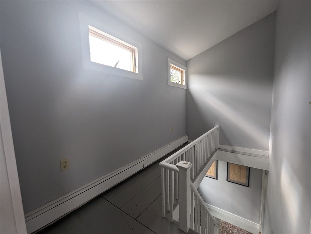 106 Great Neck Road Wareham, MA 02571 - Photo 21 of 30 a view of entryway and hall with wooden floor